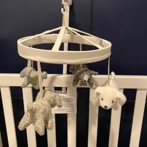 Pottery barn kids knit dog mobile and wooden arm
